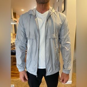 COPY - Men's fitted under armor wind breaker. Zip front